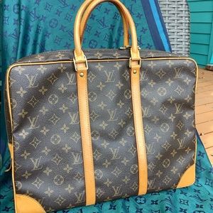 Louis Vuitton Porte documents voyage hand bag